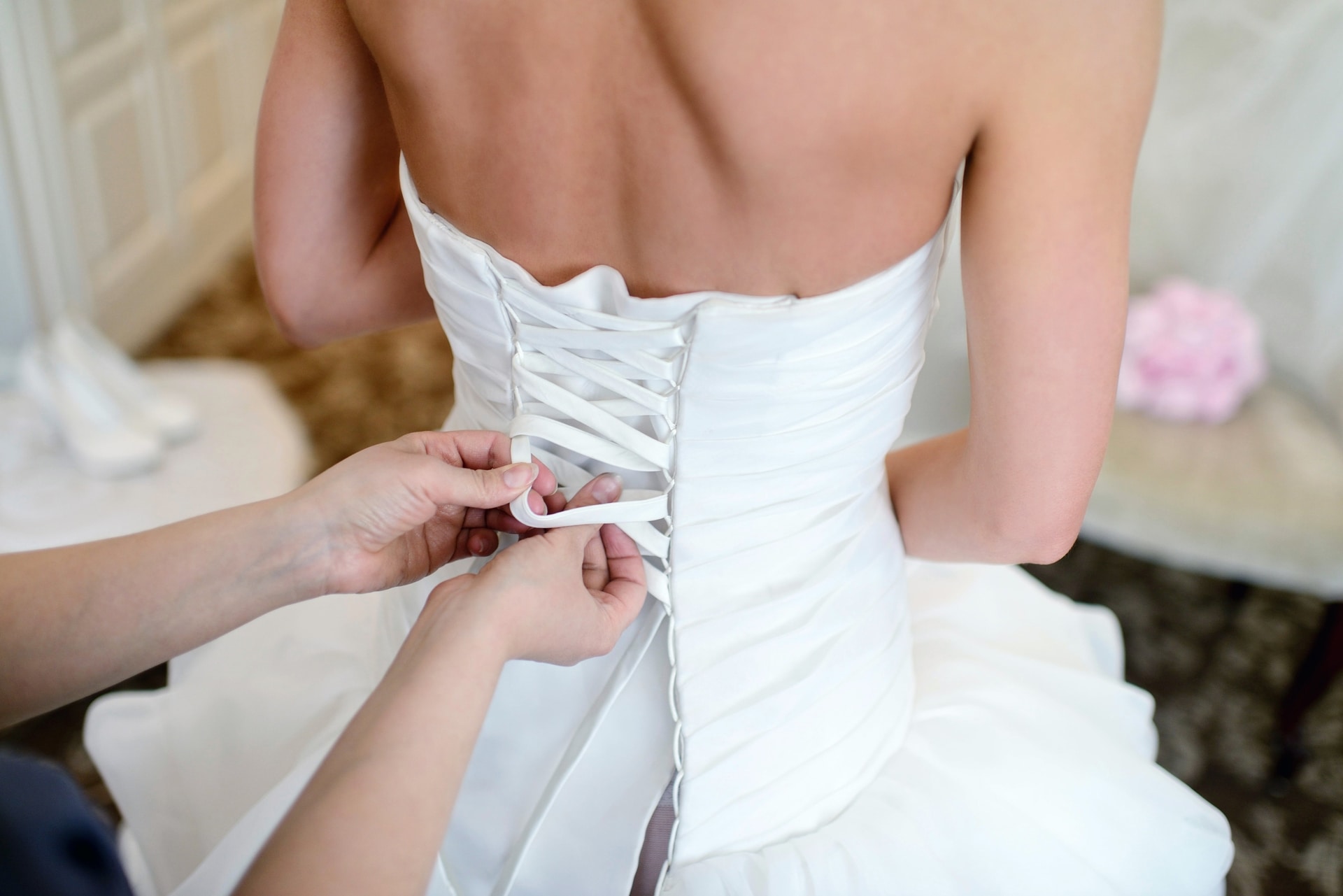 picture of a dress being adjusted